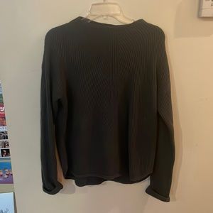 Dark green sweater from Aritizia